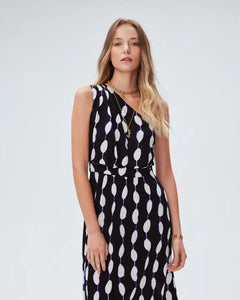 Elevate your style with our French Style Fashion Dress by DVF. This one-shoulder, mid-length dress features a unique abstract print, adding a personalized touch to your wardrobe. Stand out from the crowd and make a statement with this original and stylish dress.