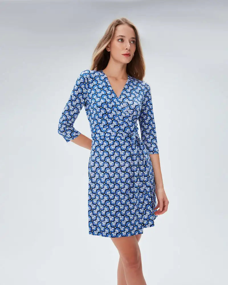 Indulge in the elegant French fashion with our Robe Octavia. This personalized dress features a unique split mid length design and original print that exudes sophistication and style. Perfect for any occasion, this dress will make you stand out from the crowd. Be bold, be fashionable, be Octavia!