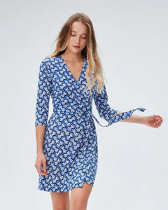 Indulge in the elegant French fashion with our Robe Octavia. This personalized dress features a unique split mid length design and original print that exudes sophistication and style. Perfect for any occasion, this dress will make you stand out from the crowd. Be bold, be fashionable, be Octavia!