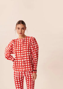 Stay stylish and unique with the Ensemble Eloise two-piece set. This set features a personalized original plaid shirt and fashionable wide leg pants, perfect for showcasing your unique taste. With its comfortable fit and trendy design, this set exudes confident and fashion-forward vibes. Elevate your wardrobe with this must-have ensemble.