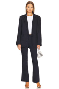 Ensemble Kathy is a professional two-piece suit for women, featuring a temperamental business jacket and a commuting pant, designed to provide superior style and comfort. Crafted from the finest materials, this suit is perfect for the modern woman on the go, combining style and function.