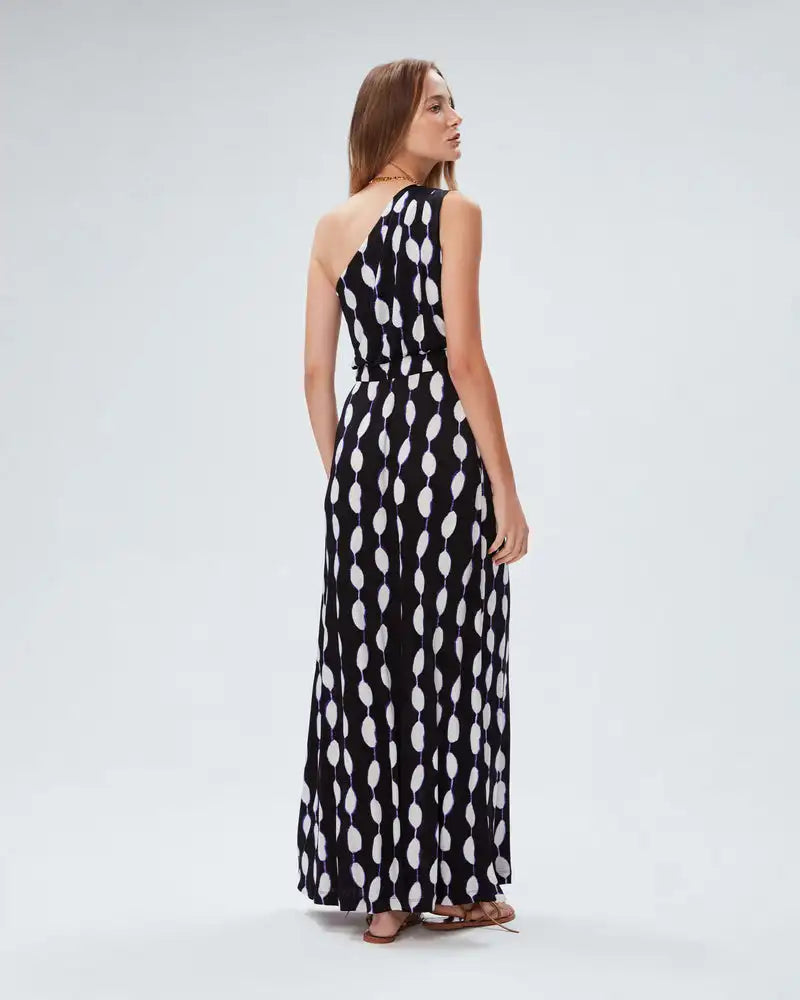 Elevate your style with our French Style Fashion Dress by DVF. This one-shoulder, mid-length dress features a unique abstract print, adding a personalized touch to your wardrobe. Stand out from the crowd and make a statement with this original and stylish dress.